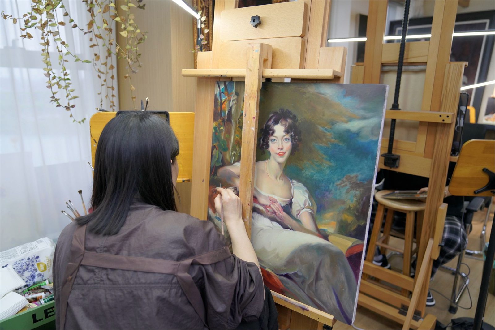 Hand-painted oil paintings in a hospitality interior
